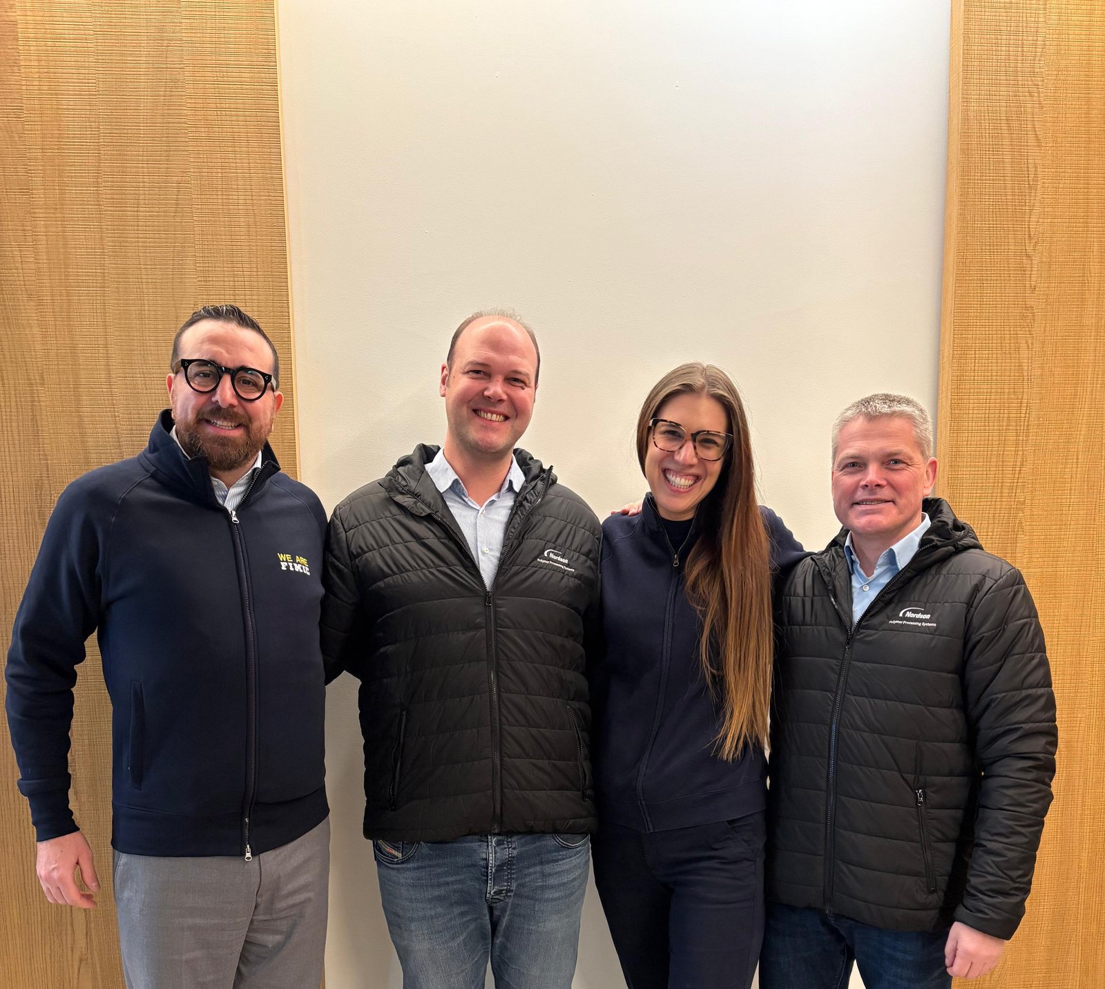 On the picture you see 4 persons. Claudio Bonafede (FIMIC Sales Director), Christian Schröder (Nordson BKG Global Segment Manager, Recycling), Erica Canaia (FIMIC CEO), Sven Conrad (Nordson BKG Global Segment Development Director)